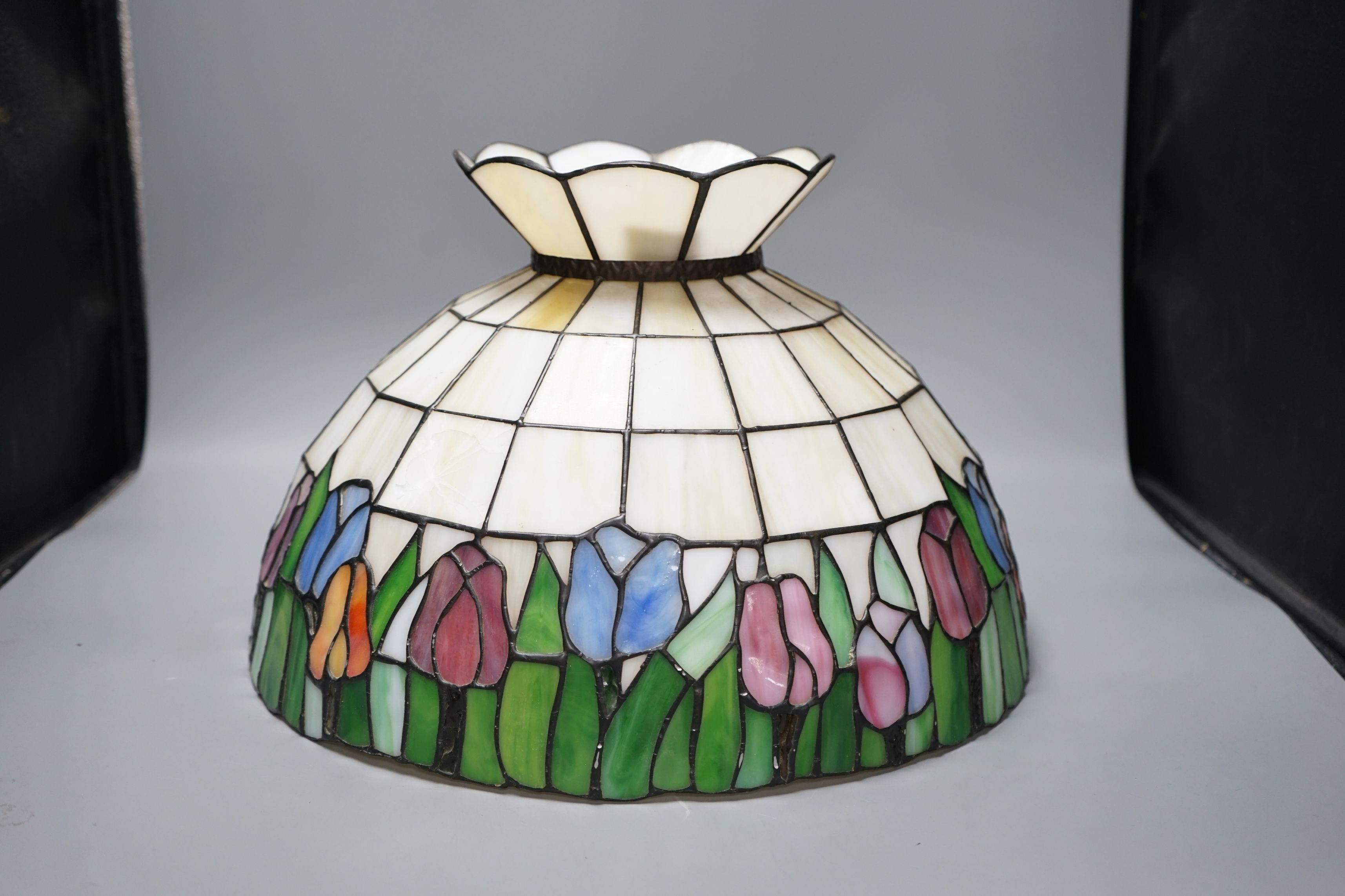 A large Tiffany style glass ceiling shade, 28cms high